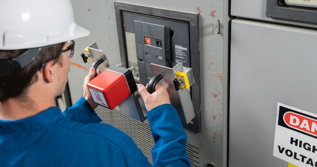 Technician installing RSK-NW20 on Switchgear